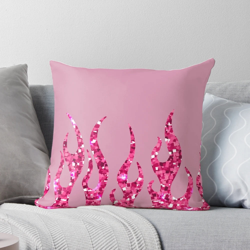 Vibrant pink pillow with glittering flames, perfect for a Y2K-inspired, retro aesthetic
