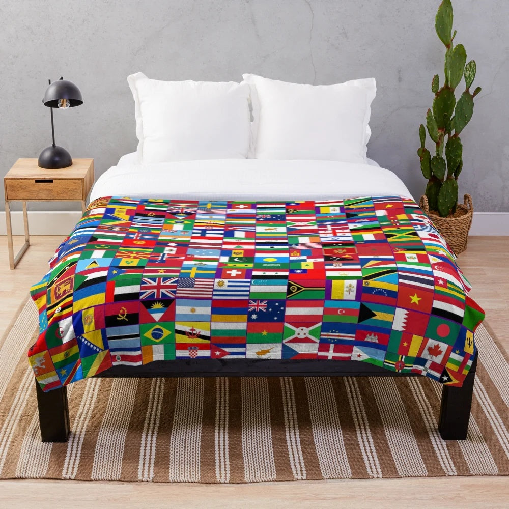 Plush blanket featuring a vibrant world flags design