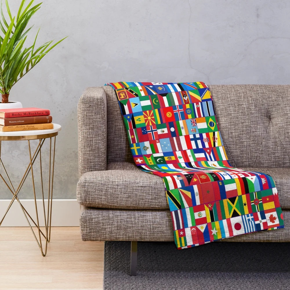Plush blanket featuring a vibrant world flags design
