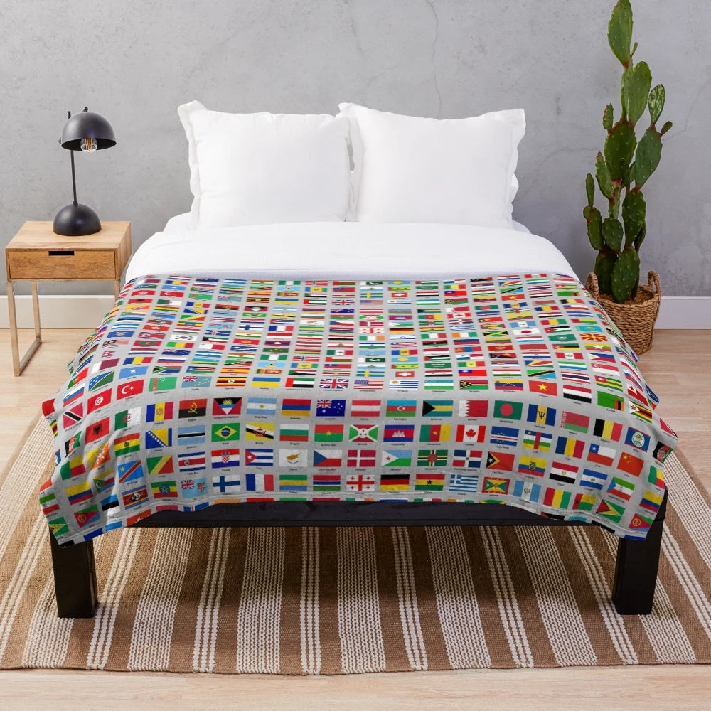 Plush blanket featuring flags from around the world