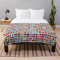 Plush blanket featuring flags from around the world