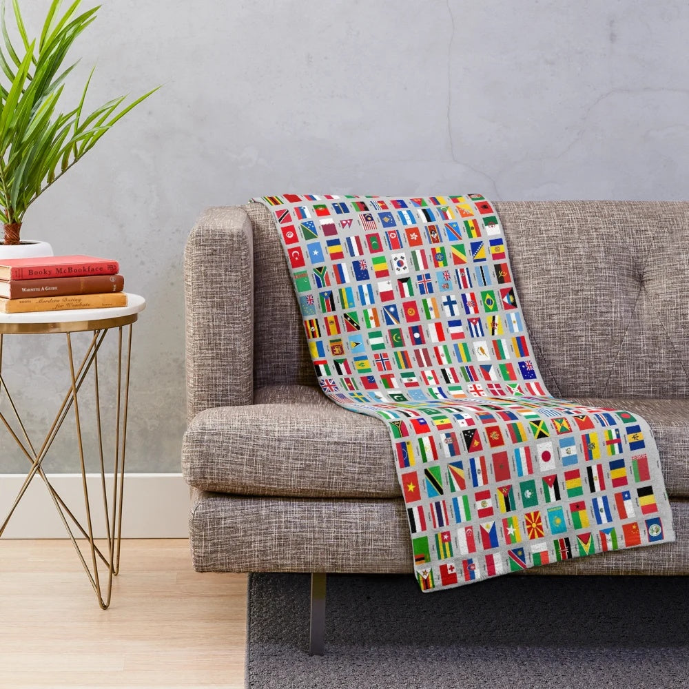 Plush blanket featuring flags from around the world