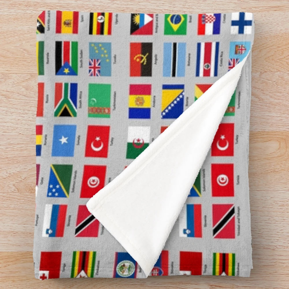 Plush blanket featuring flags from around the world