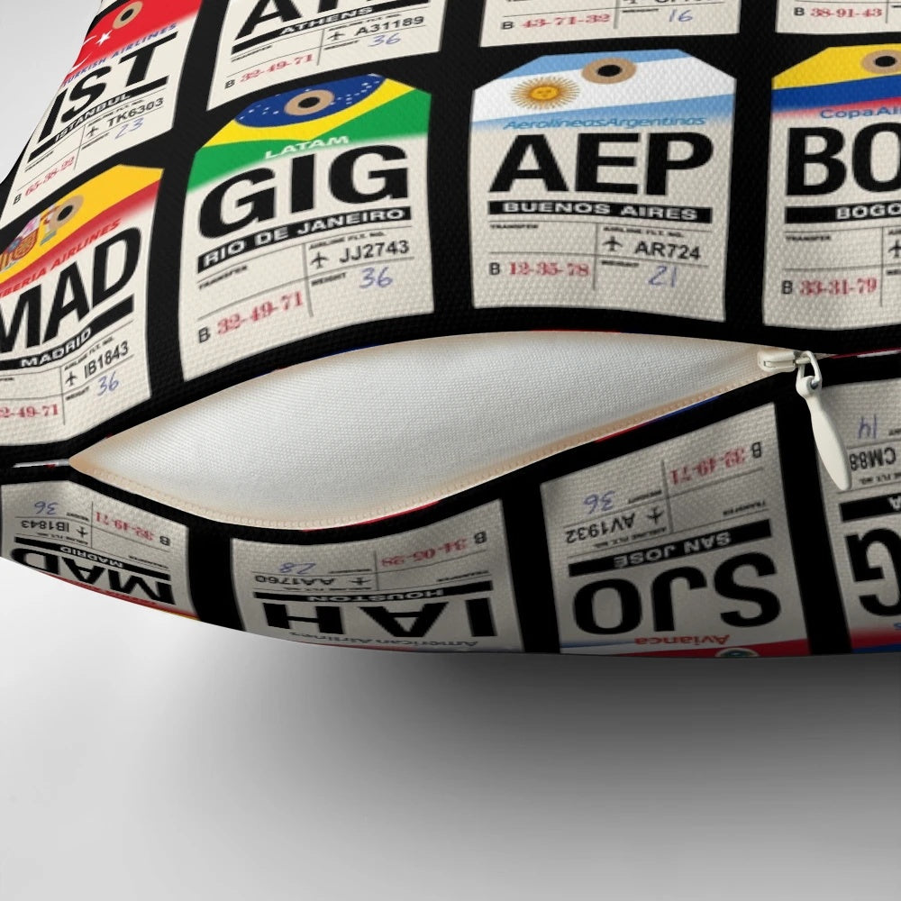 Airline luggage tag-inspired mosaic pillow with flags and IATA codes for worldwide destinations