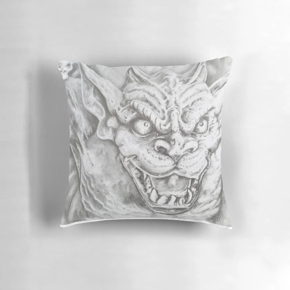A cozy decorative pillow featuring a realistic sketch-style gargoyle design in shades of grey and black.