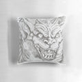A cozy decorative pillow featuring a realistic sketch-style gargoyle design in shades of grey and black.