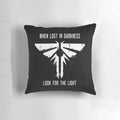 A Pillow Featuring Glowing Fireflies, a Symbol of Hope in the 'The Last of Us' Apocalyptic Gaming Universe
