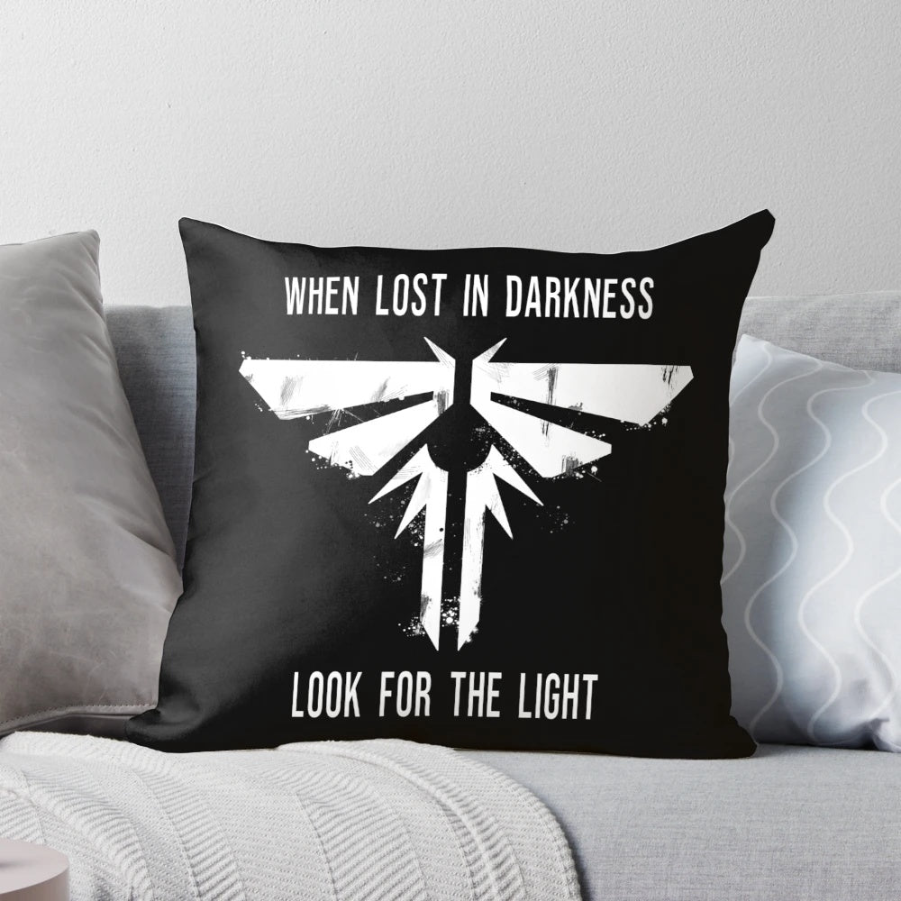A Pillow Featuring Glowing Fireflies, a Symbol of Hope in the 'The Last of Us' Apocalyptic Gaming Universe