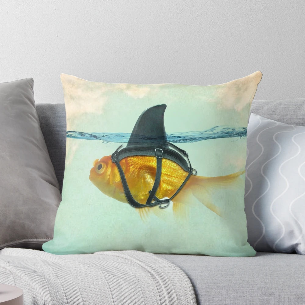 Playful decorative pillow featuring a goldfish with a shark fin design
