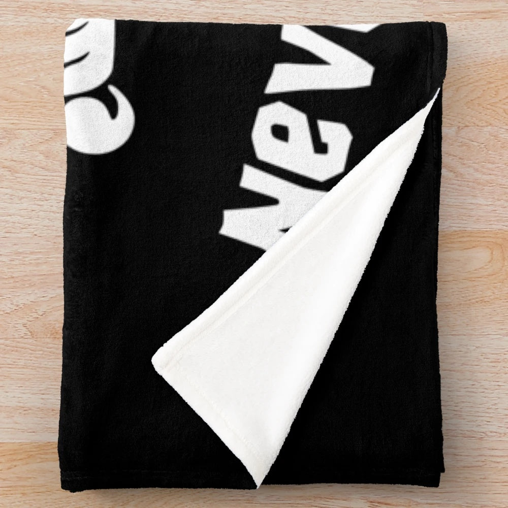 Goonies-themed plush blanket with pirate skull and swords