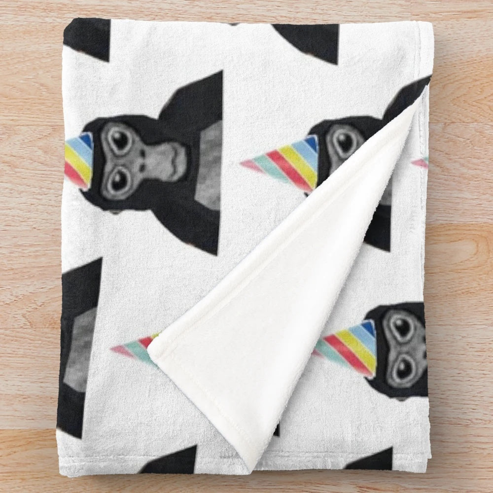 Gorilla Tag inspired plush blanket featuring a monkey wearing a birthday hat