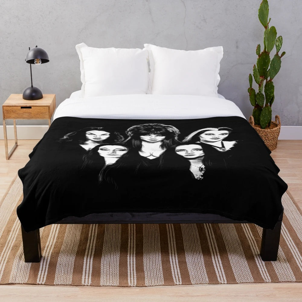 Goth-Inspired Plush Blanket featuring iconic gothic figures like Elvira, Vampira, Lily Munster, and Morticia Addams