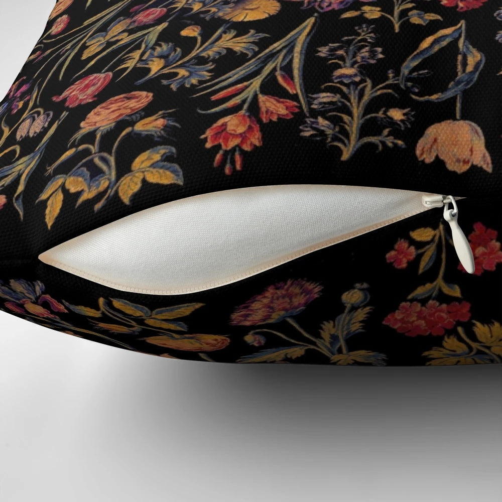 Black and white medieval flowers printed on a decorative pillow cover
