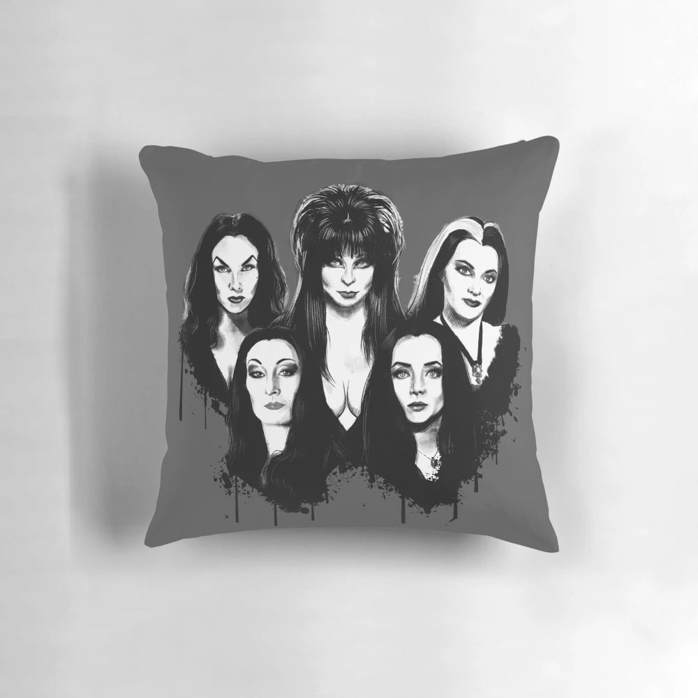 Four black-and-white pillows featuring iconic goth and horror movie characters