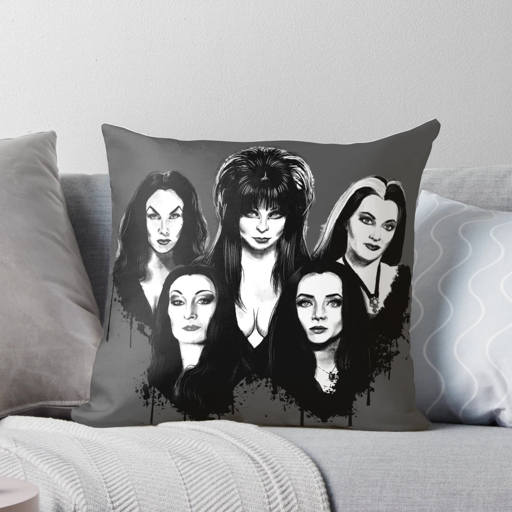 Four black-and-white pillows featuring iconic goth and horror movie characters