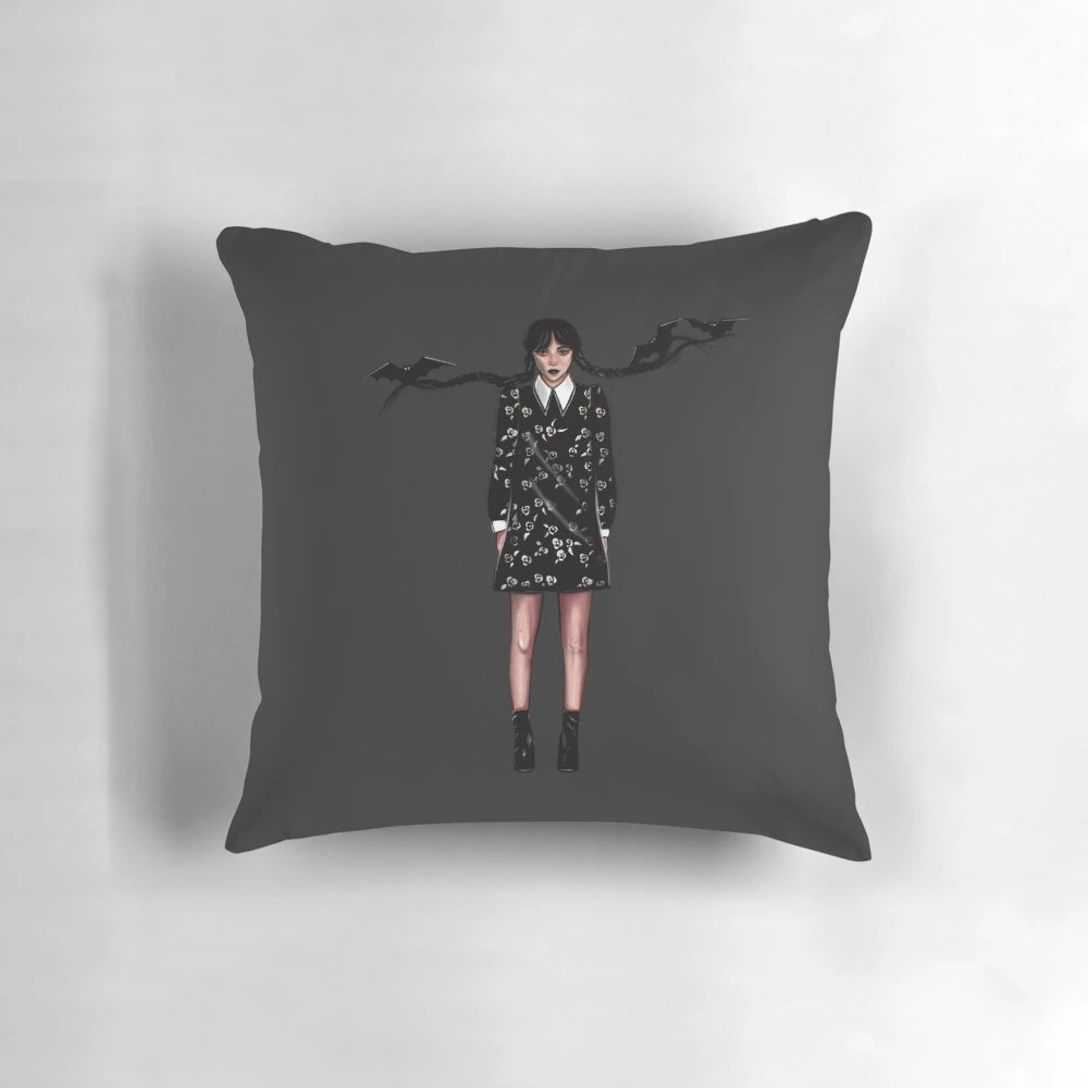 Stylish gothic-inspired throw pillow design featuring the Addams family characters Wednesday and Friday with a crescent moon and pumpkin motif.