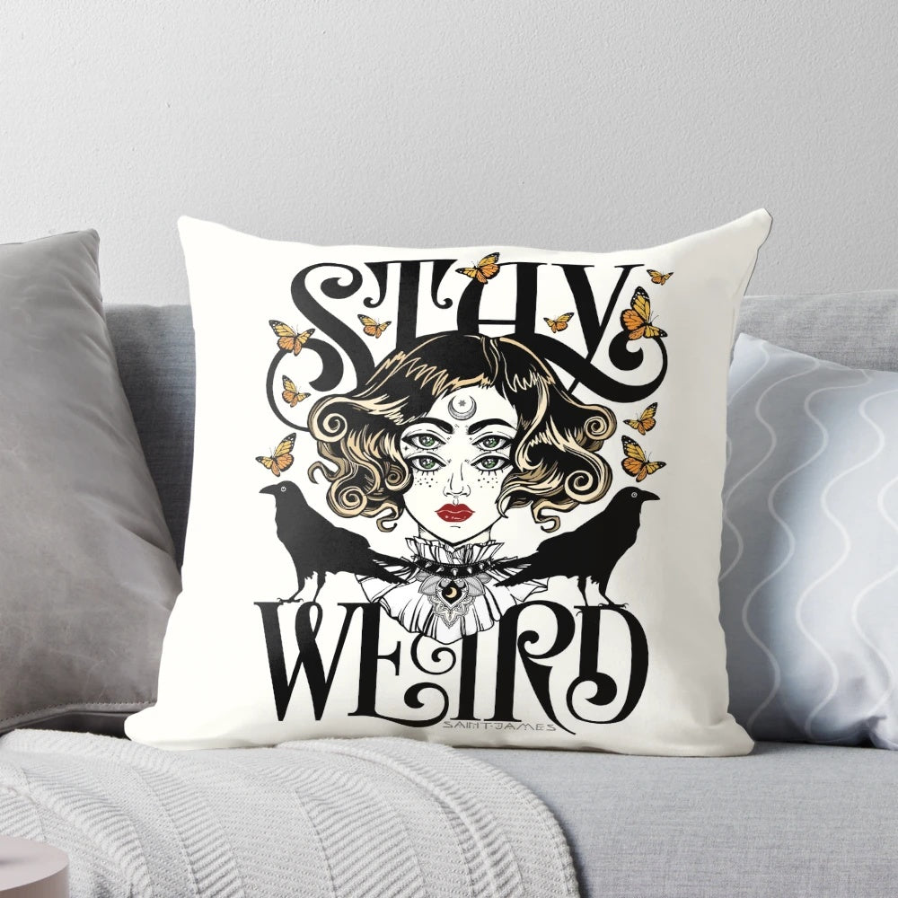 A decorative pillow featuring a gothic, witchy design with a raven and rose.