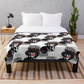Cozy plush blanket featuring a gothic witch girl in a dark, spooky design.