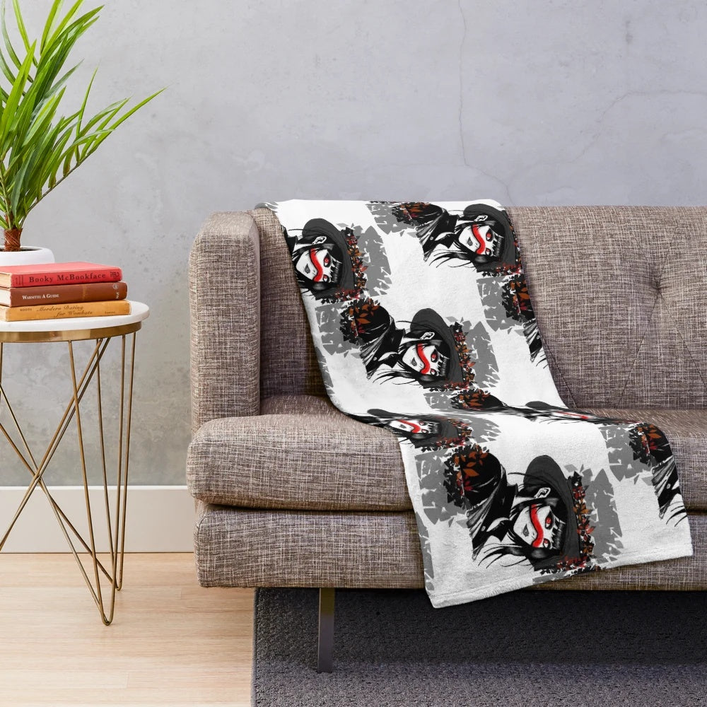 Cozy plush blanket featuring a gothic witch girl in a dark, spooky design.