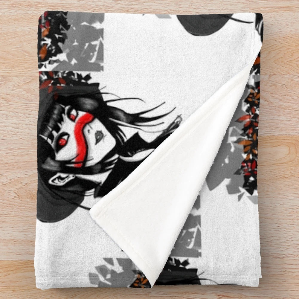 Cozy plush blanket featuring a gothic witch girl in a dark, spooky design.
