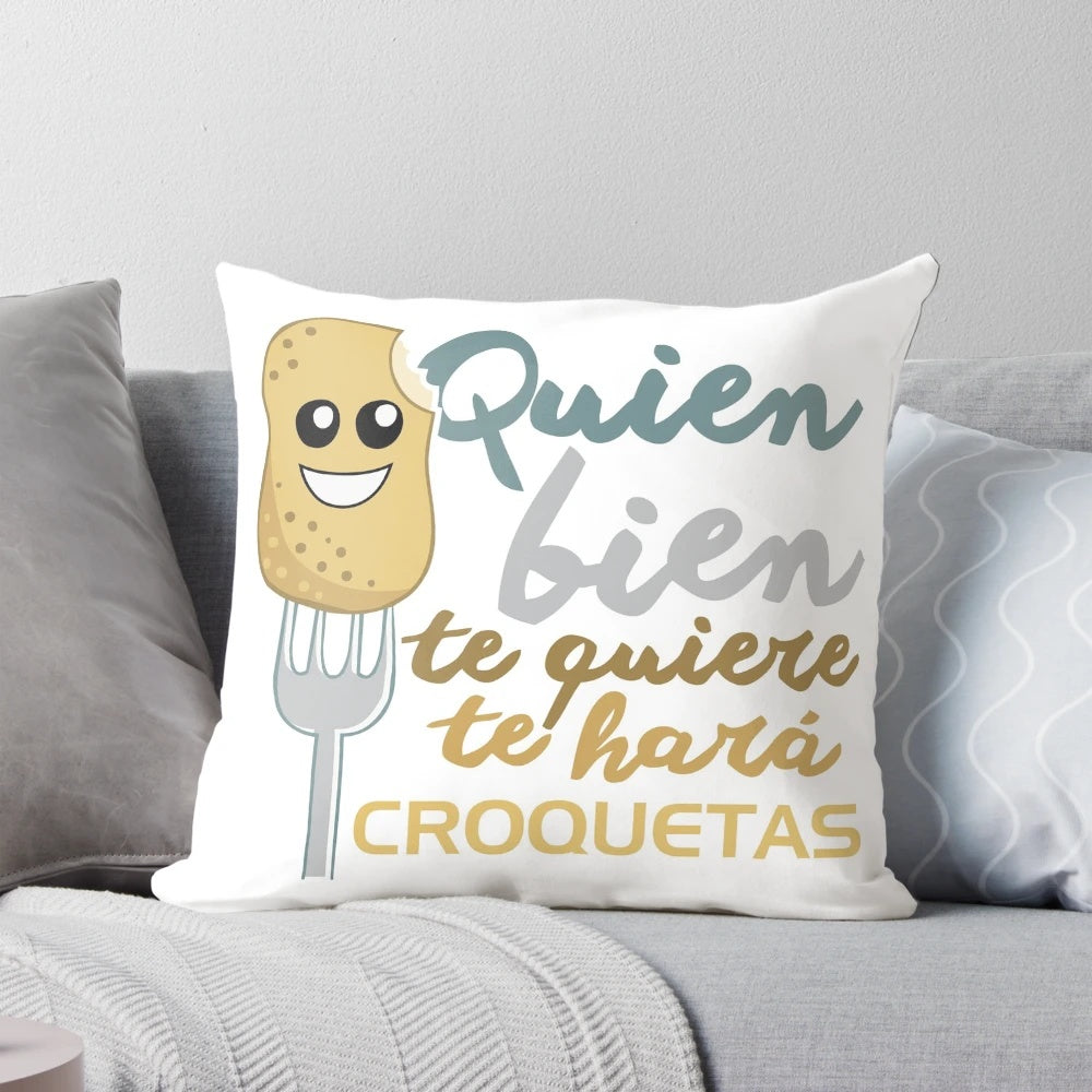 Soft and plush pillow shaped like delicious croquetas, a Spanish fried appetizer.