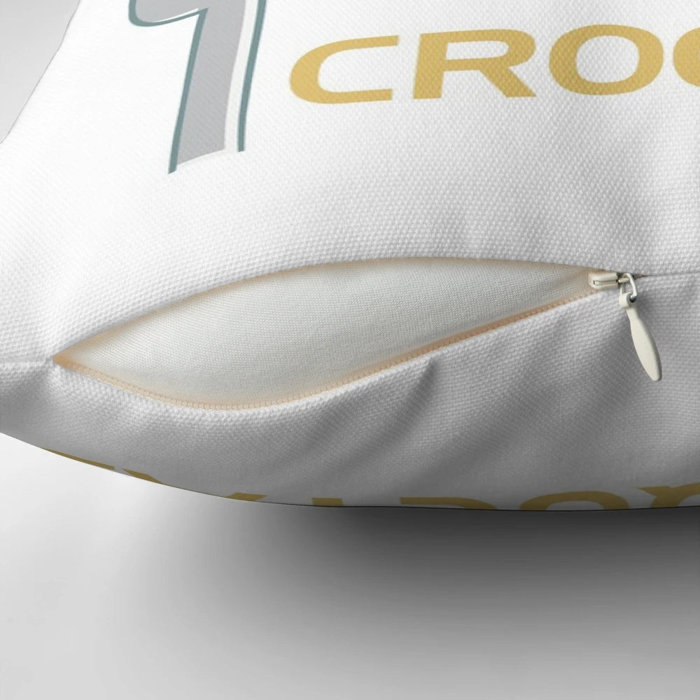 Soft and plush pillow shaped like delicious croquetas, a Spanish fried appetizer.