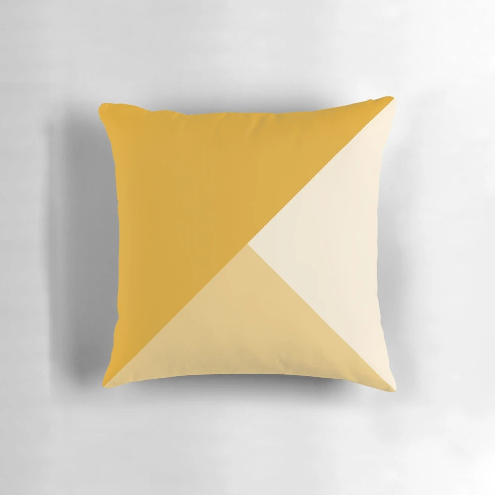 Mustard yellow gradient geometric pattern pillow with a modern, minimalist design