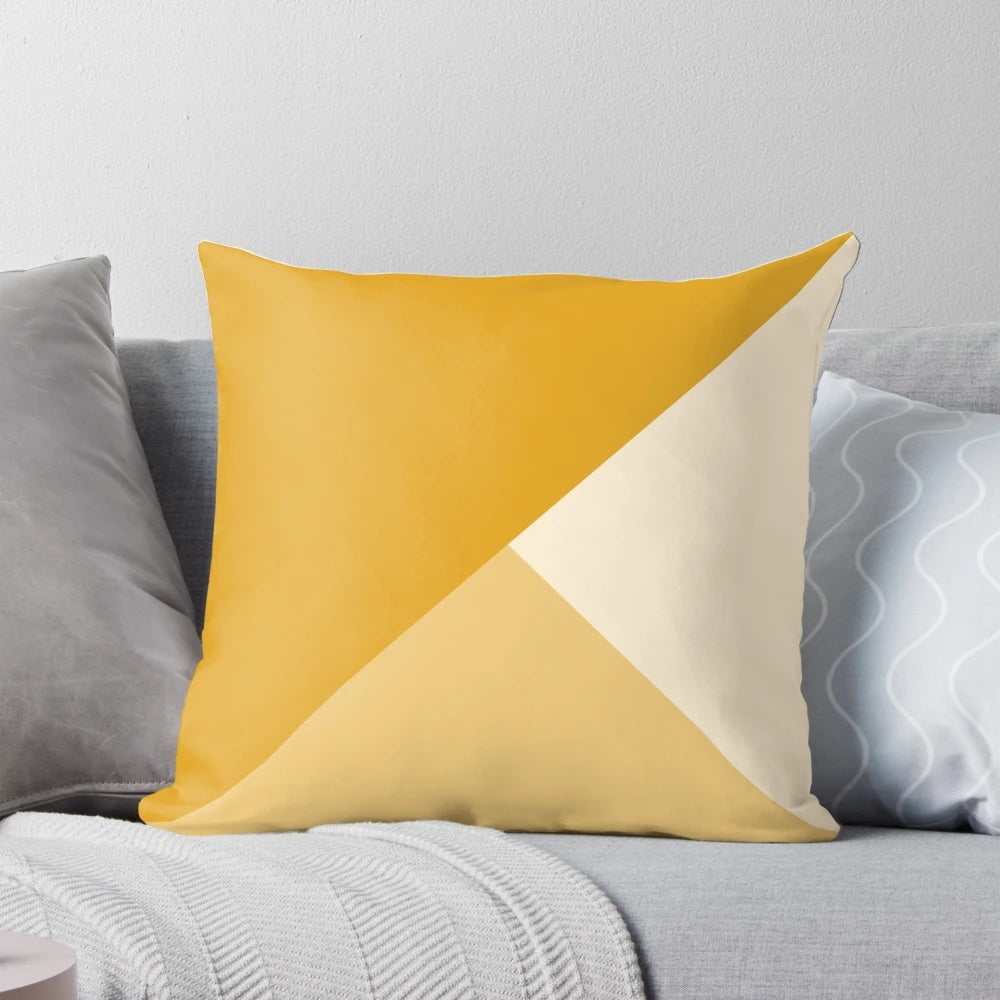 Mustard yellow gradient geometric pattern pillow with a modern, minimalist design