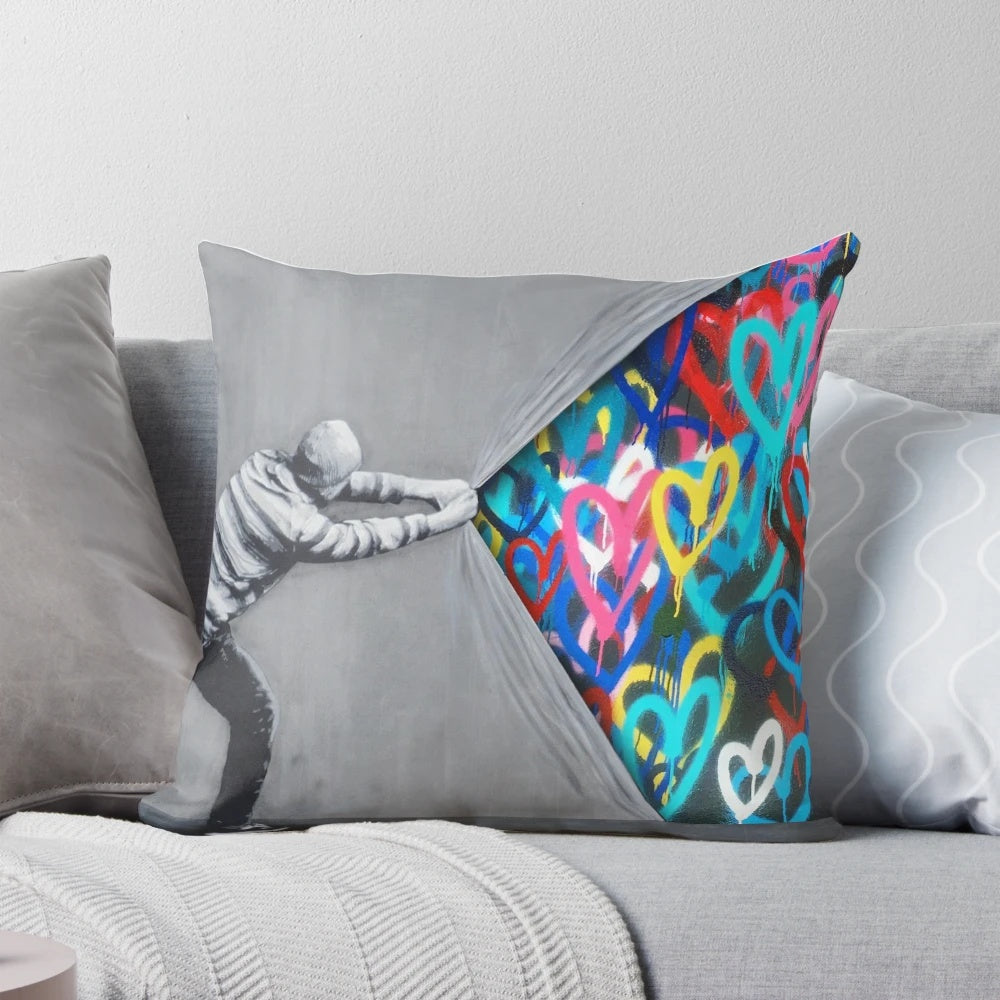 Graffiti hearts spray paint art pillow with a modern, thought-provoking design.