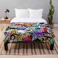 Graffiti-inspired plush blanket featuring vibrant urban street art design