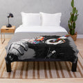 Graffiti-inspired thinker chimp plush blanket with headphones