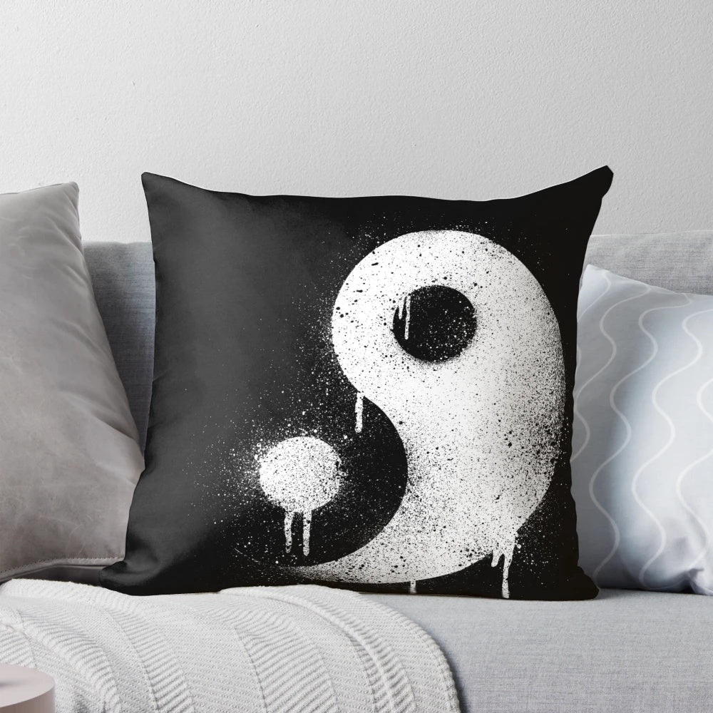 Graffiti-inspired yin yang pillow with spray paint, distressed and weathered design