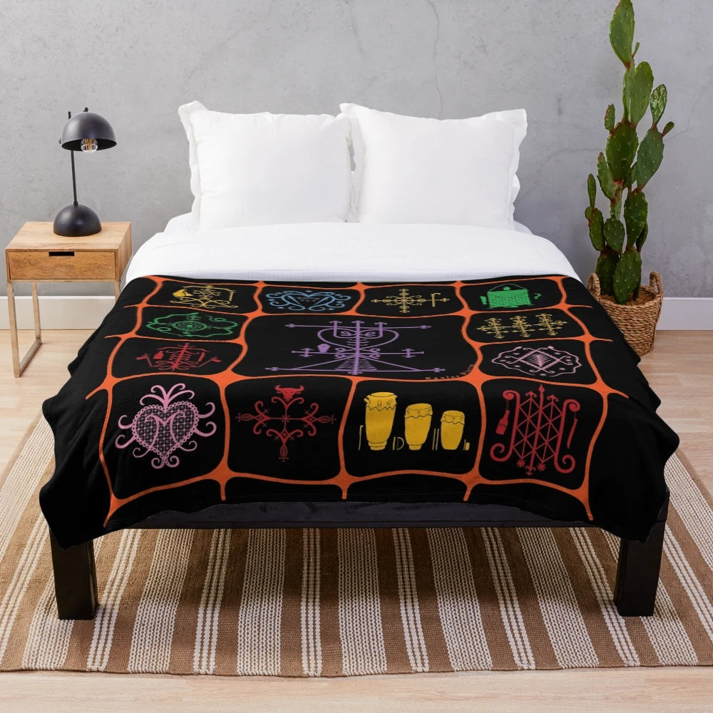 Grann Brijit plush blanket featuring Haitian voodoo symbols and cultural elements