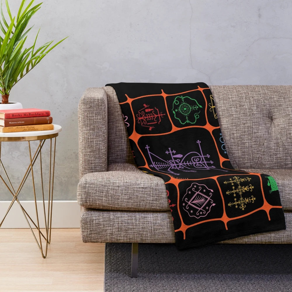 Grann Brijit plush blanket featuring Haitian voodoo symbols and cultural elements