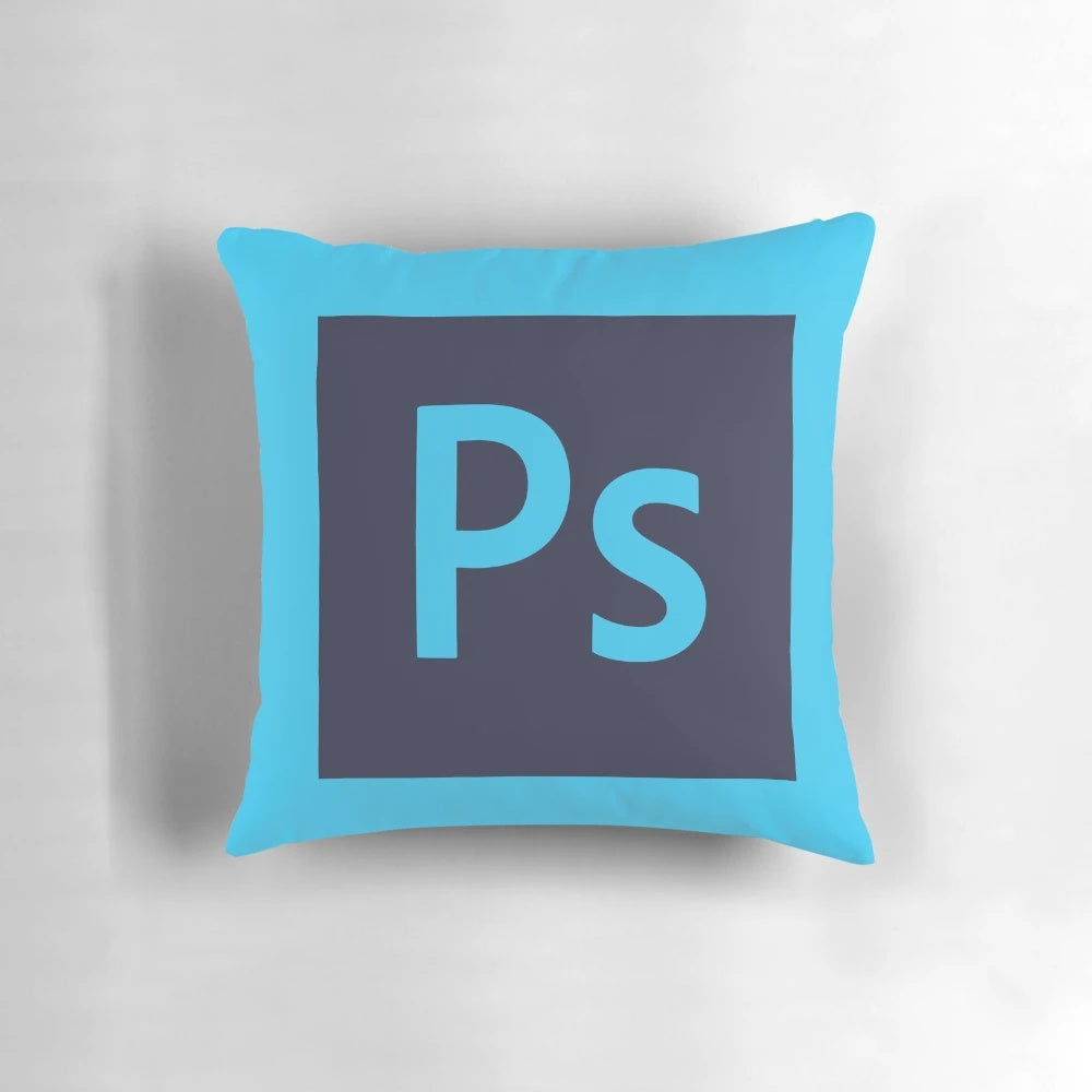 Photoshop-inspired decorative pillow featuring Adobe software icons and branding