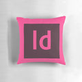 A decorative pillow featuring the Adobe InDesign logo, designed to enhance creative workspaces.