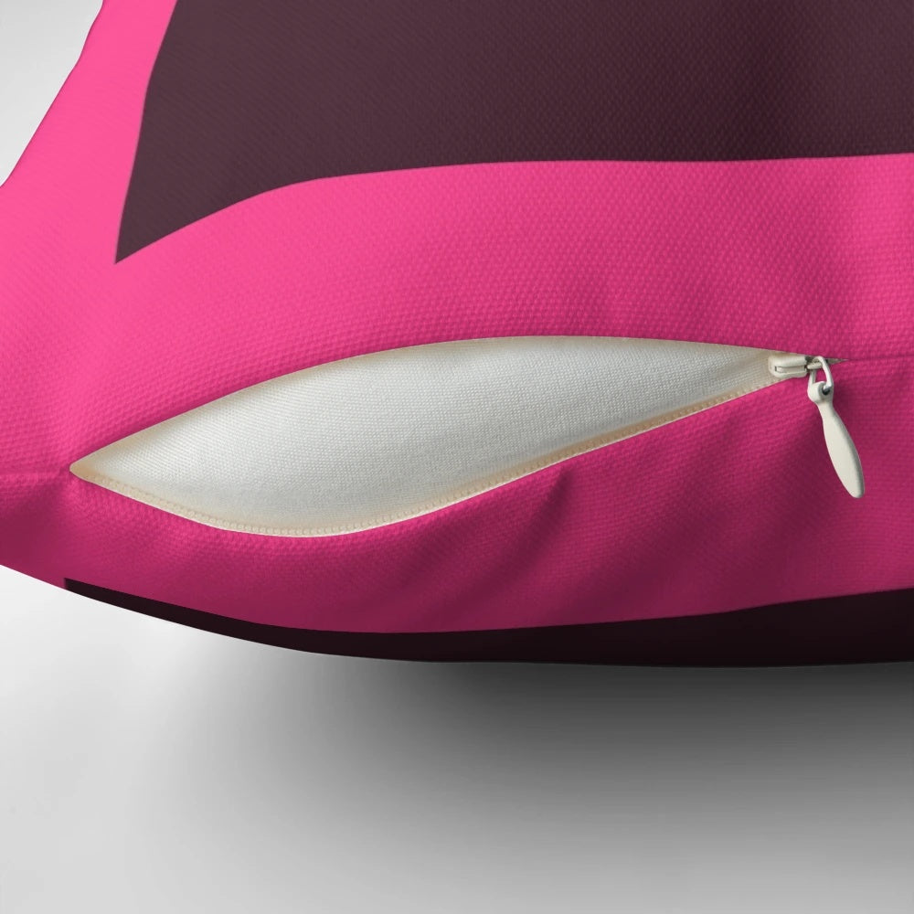 A decorative pillow featuring the Adobe InDesign logo, designed to enhance creative workspaces.