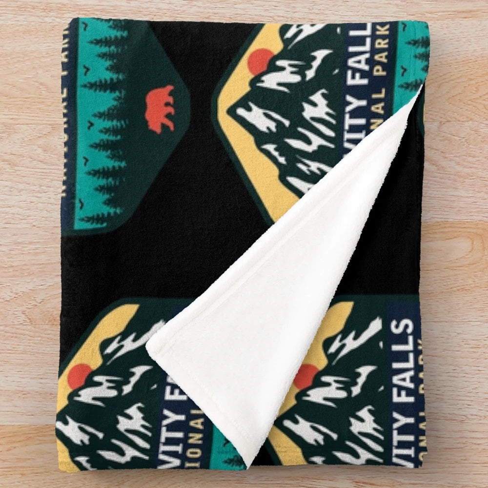 Gravity Falls inspired plush blanket featuring national park design