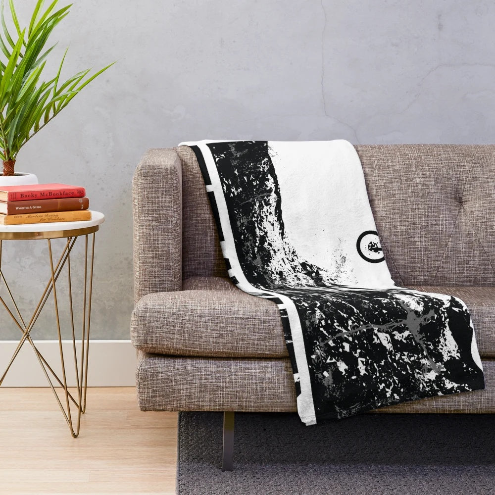 Downhill mountain biking silhouette design on a plush blanket