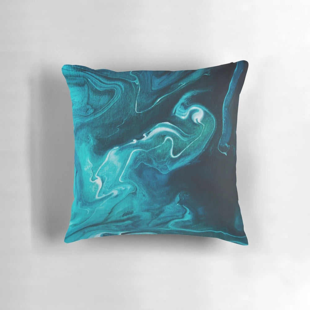 Gravity II modern decorative pillow with abstract teal and green swirl design