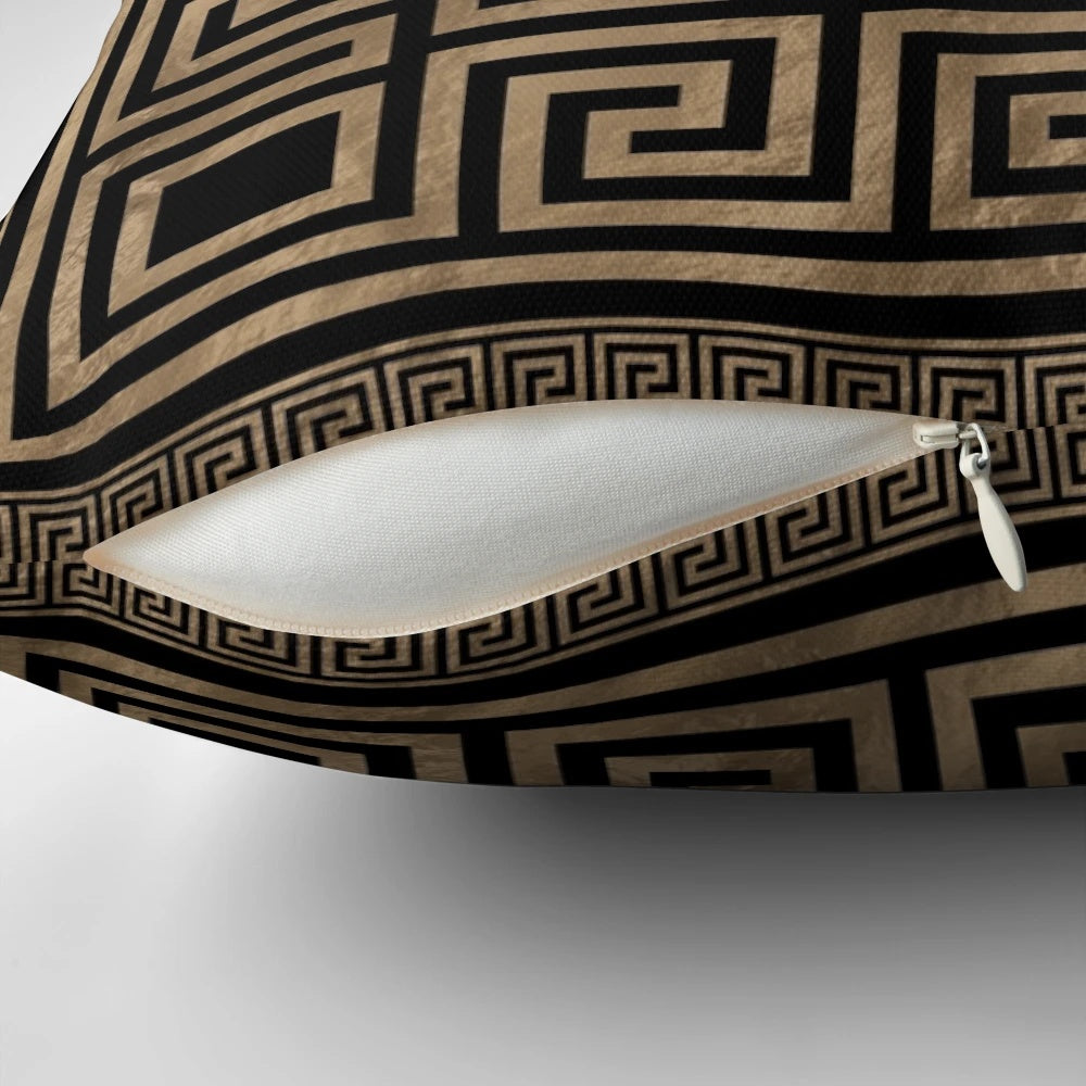 Decorative throw pillow featuring a Greek key ornament and meander pattern in gold on a black background.
