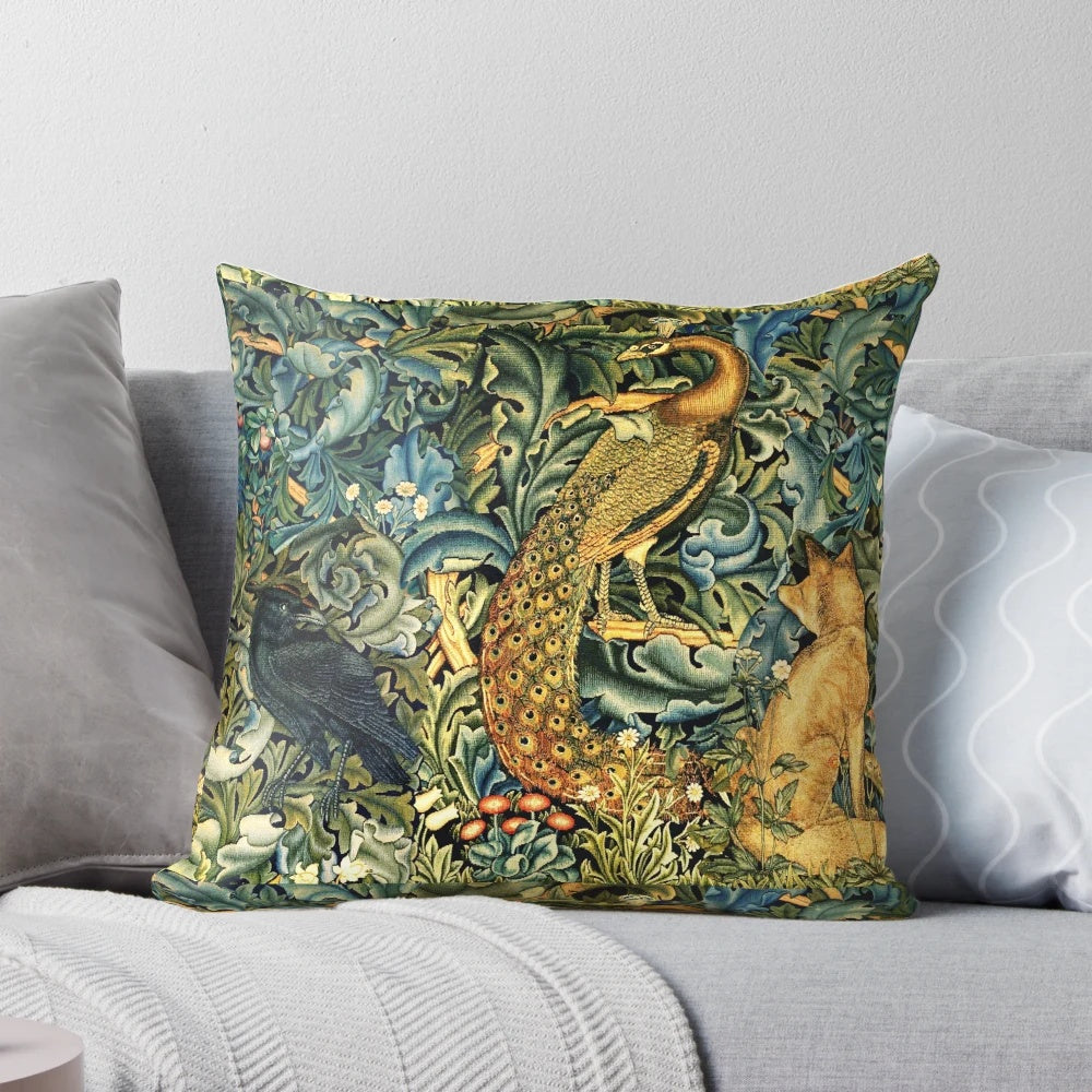 Green floral pillow featuring a vintage-inspired design with peacock, raven, and other forest animals in a lush, botanical setting.