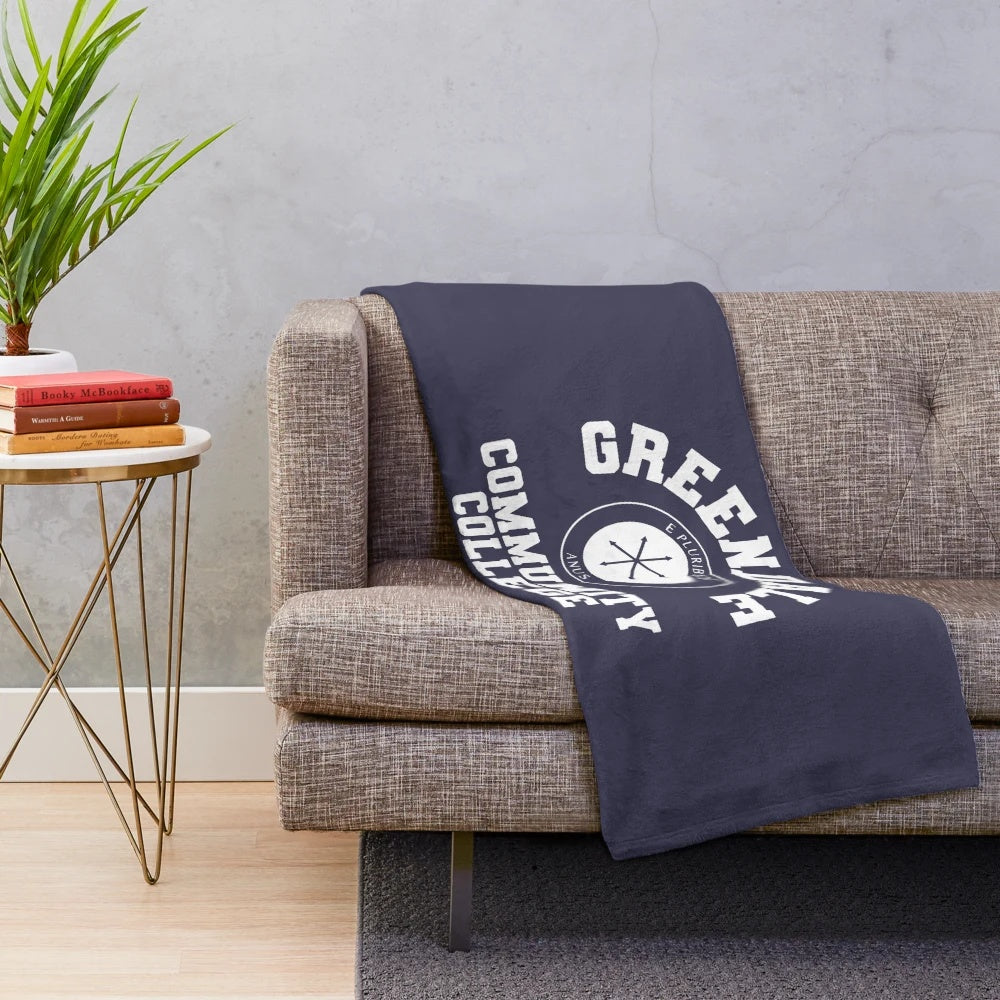 Greendale Community College inspired plush blanket with characters from the popular TV show Community