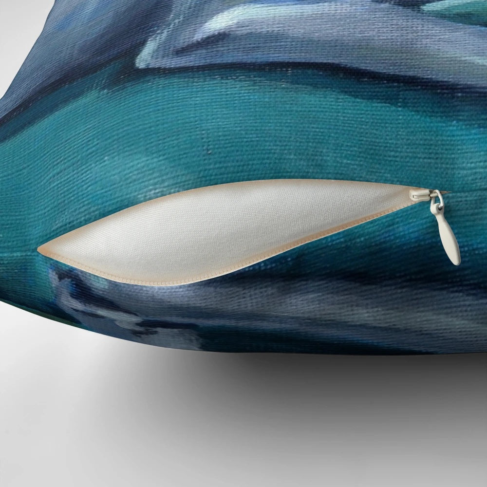 A blue and white decorative pillow featuring a greyhound or whippet breed dog design.