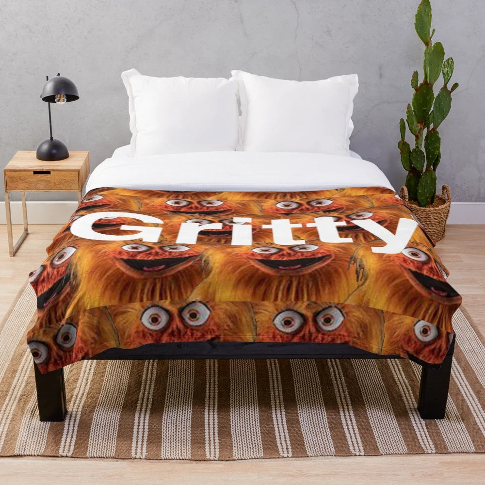 Gritty-inspired plush blanket with Philly sports team colors