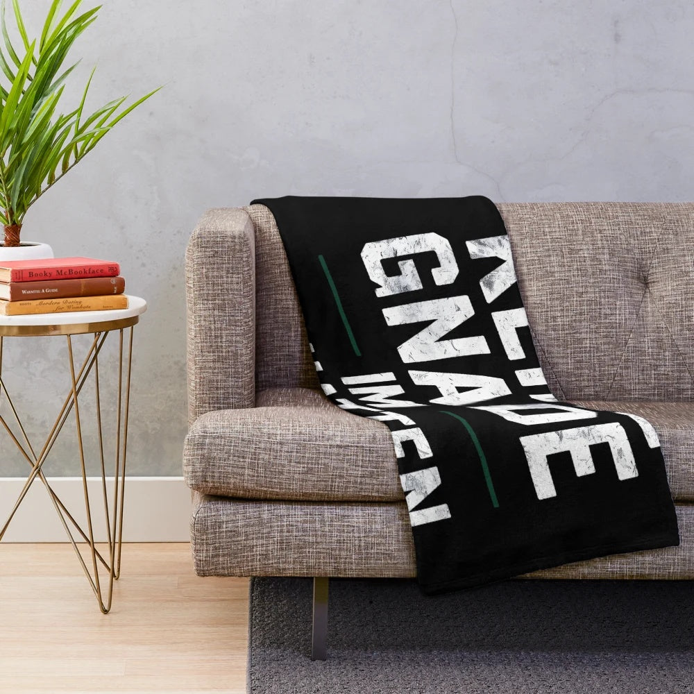 Plush blanket with a gritty urban shadow design, perfect for fashion-conscious youth.