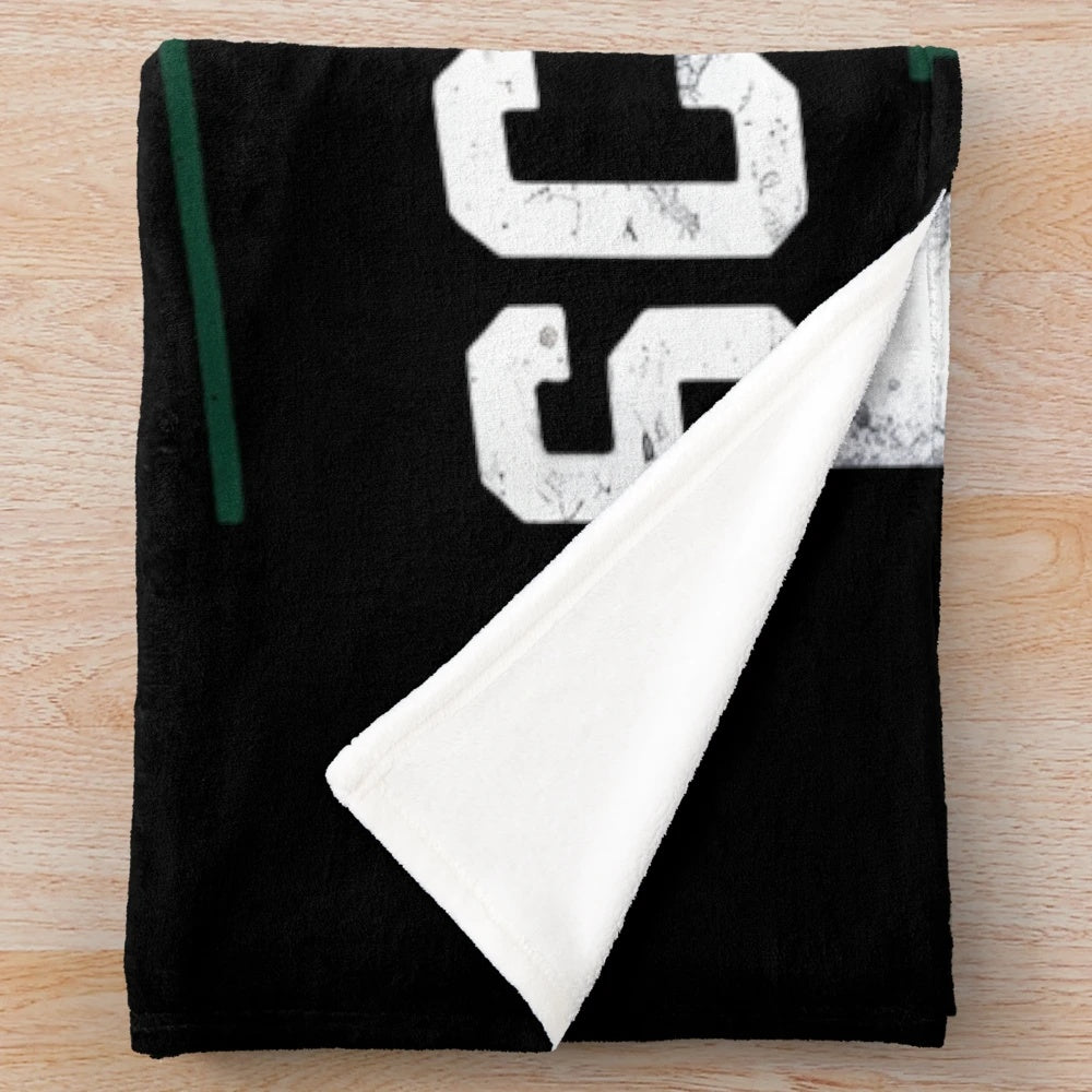 Plush blanket with a gritty urban shadow design, perfect for fashion-conscious youth.
