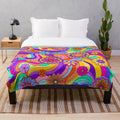 Colorful psychedelic floral plush blanket with groovy 70s style