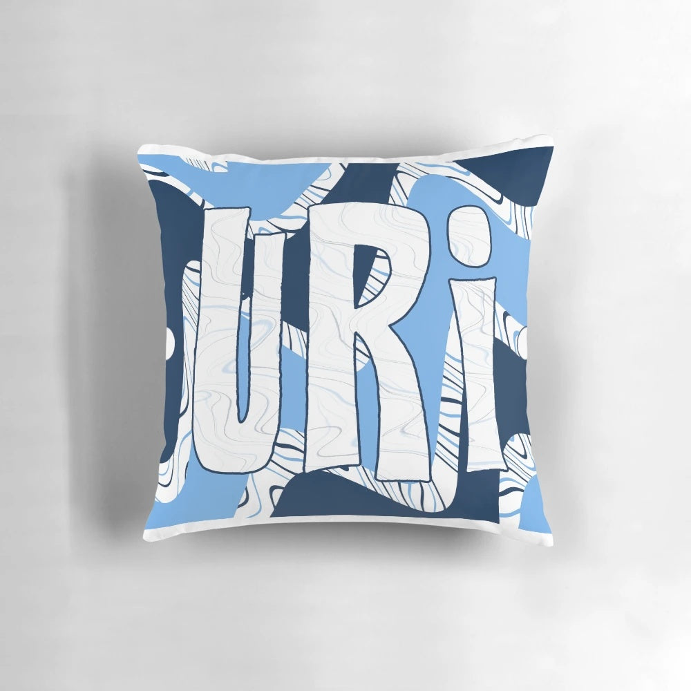 Vibrant blue and light blue wavy pattern pillow with 'University of Rhode Island' text