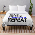 Grunge plush blanket with "Eat Sleep Cinema Repeat" design